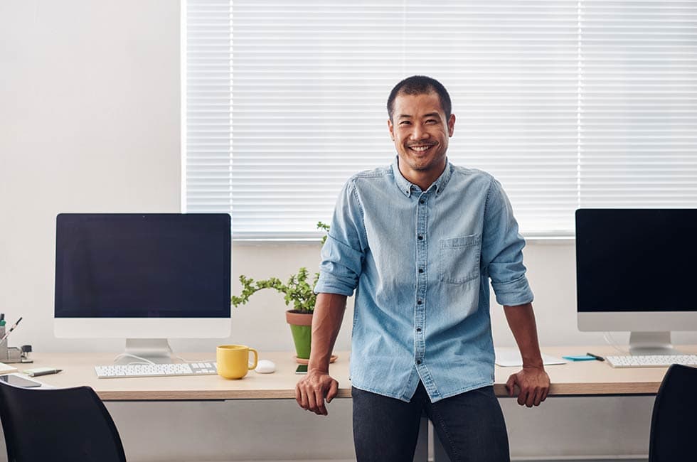 Sitting on an elevated standing desk