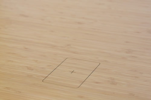Mid brown bamboo wireless charging outline